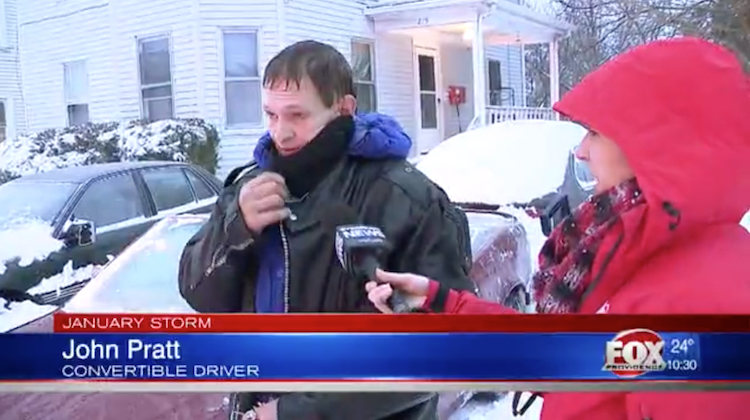 The Hog Ring - Man Drives Top Down Through a Blizzard