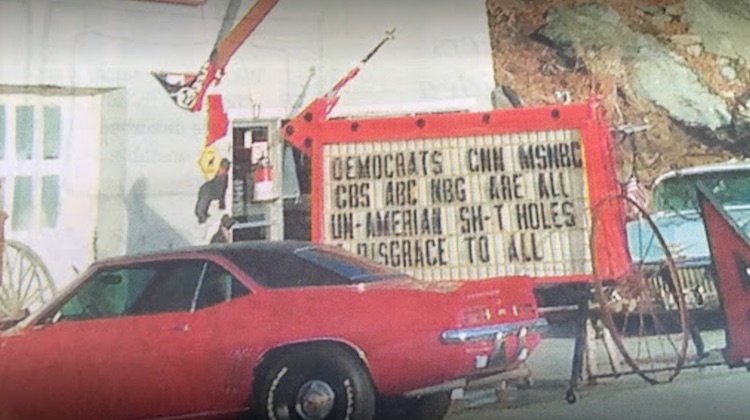 The Hog Ring - Trim Shop Sparks Outrage with Political Sign 2